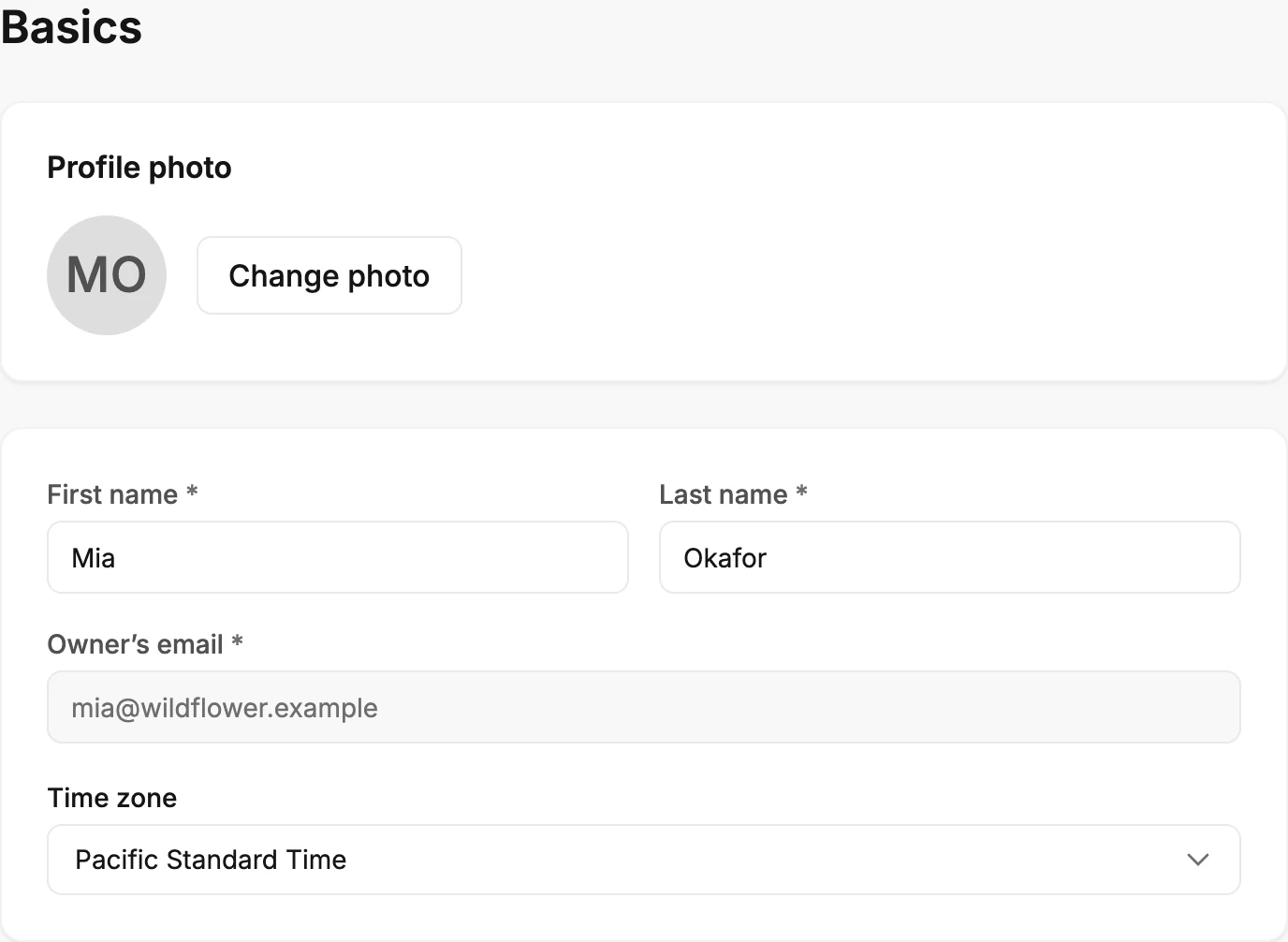 The Basics page: the Profile photo card with Change photo, then the card with First name, Last name, Owner’s email, and Time zone.