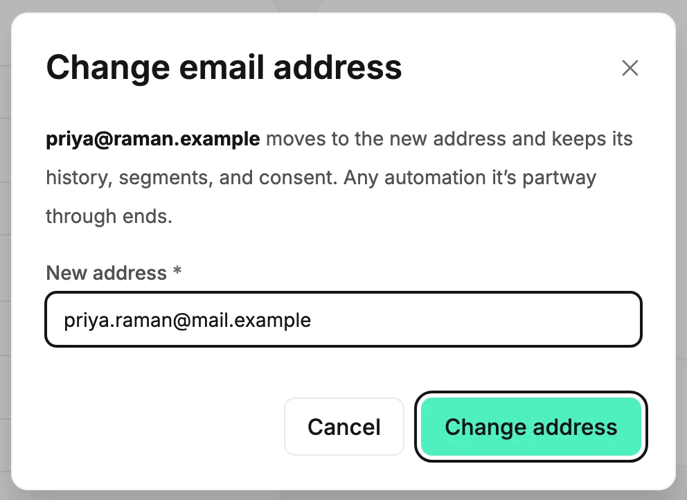 The Change email address dialog, with a new address typed in and the Change address button ready.