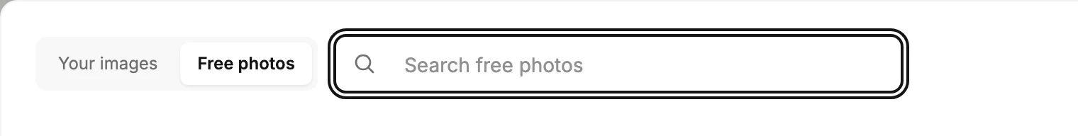 The image picker's window open on Free photos, with the ringed Search free photos field beside the two view labels in its top row.