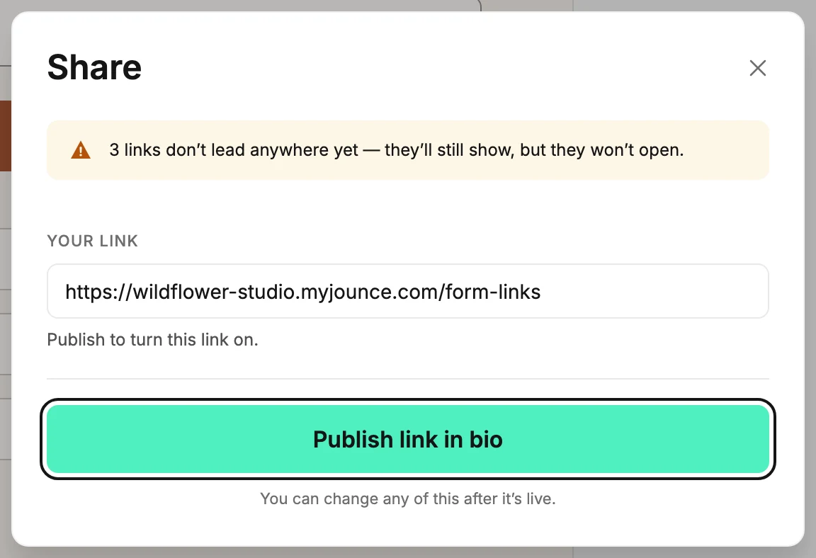 The Share dialog on a draft link-in-bio page, with the address under Your link and Publish link in bio ringed.